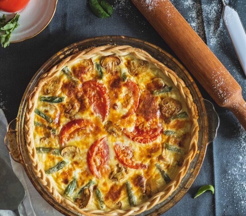 pizza on brown wooden tray